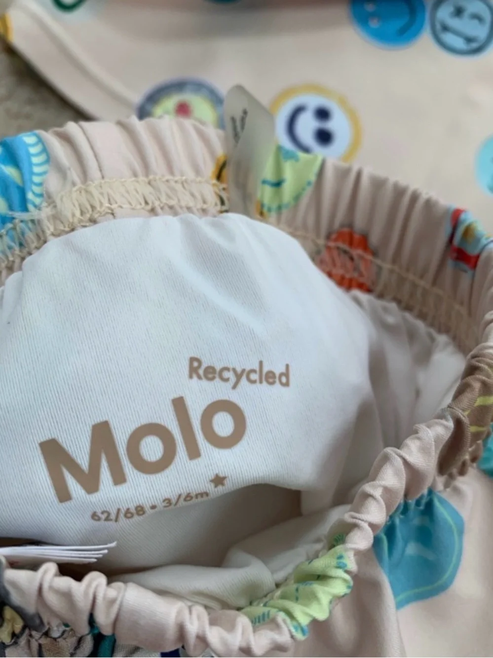 Molo Beige Swimsuit with Orange, Blue and Green Accents